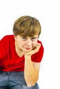 Smart boy sitting on a chair Royalty Free Stock Photo