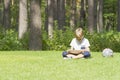 Smart boy using a tablet outdoors. Technology, lifestyle, education, people concept Royalty Free Stock Photo