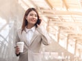 Smart business woman in a suit with mobile phone. Royalty Free Stock Photo