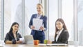 Smart business women meeting at office with faÃÂ§ade glassing background and modern building. teamwork professional success concept Royalty Free Stock Photo