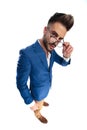 Smart casual man with hand in pocket listening to opinions Royalty Free Stock Photo