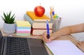 Smart child, boy 9-10 years, primary school student writes letter to friend in English, Back to school concept, doing homework in Royalty Free Stock Photo