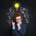 Smart child having idea. Brainstorming and idea concept Royalty Free Stock Photo
