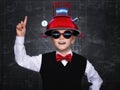 Smart child pretend to be inventor. Funny kid wearing helmet . Education, artificial intelligence and business idea concept