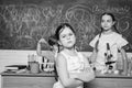 Smart children performing chemistry test. Small pupil learning chemistry in school. Chemistry laboratory. Practical Royalty Free Stock Photo