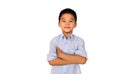 Smart and clever Asian boy standing with his arms crossed over isolated white background. Royalty Free Stock Photo
