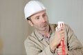 Smart concentrated builder in construction site Royalty Free Stock Photo