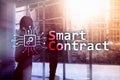 Smart contract, blockchain technology in business, finance hi-tech concept. Skyscrapers background Royalty Free Stock Photo