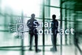 Smart contract, blockchain technology in business, finance hi-tech concept. Skyscrapers background Royalty Free Stock Photo