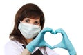 Smart doctor woman in protective mask with heart. Medical support, healthy lifestyle, healthcare, medicine and ambulance concept