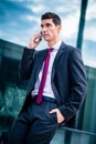 Smart dressed man talking in phone