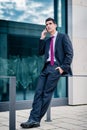 Smart dressed man talking in phone