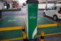 Smart Dubai car charging stations in parking lot. Charging modern electric cars new energy vehicles, NEV on the street station. Royalty Free Stock Photo