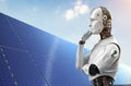 Smart energy concept with robot and solar panel Royalty Free Stock Photo