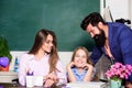 Smart family. Teaching daughter. Favorable conditions for learning. Good learning environment. Learners must feel Royalty Free Stock Photo