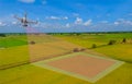 Smart farmer use drone for various fields. Drone for agriculture and use for various field. Drone copter flying with digital camer Royalty Free Stock Photo
