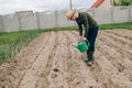 Smart farming using modern technologies in agriculture. Man agronomist farmer with digital tablet computer in wheat field using Royalty Free Stock Photo