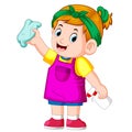 The smart girl clean up everything with the towel and she using apron