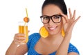 Smart Girl with Orange Juice and Orange Slice Earrings White Background Royalty Free Stock Photo