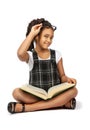 Smart girl reading a big green book Royalty Free Stock Photo