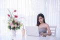 Smart girl`s working on notebook , Workingwoman using laptop in the room