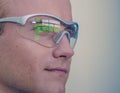 Smart glasses futuristic technology concept, man wear smart glasses with augmented reality to Managing field service and assembly,