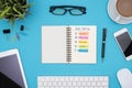 Smart goal setting with office supplies over blue desk Royalty Free Stock Photo