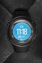 Smart GPS Suunto watch for sports and adventure on slate background. Smartwatch with digital screen. Electronic wireless gadget Royalty Free Stock Photo