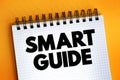 Smart Guide text on notepad, concept background