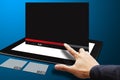 Smart hand touch the VDO download bar on tablet Royalty Free Stock Photo