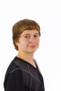 Smart happy teen boy posing in studio Royalty Free Stock Photo