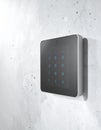 Smart Home Access Control Panel on Concrete Wall Royalty Free Stock Photo