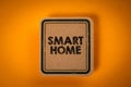 Smart Home. Cardboard note sheet with text on a yellow background Royalty Free Stock Photo