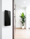 Smart Home Control Panel in a Modern Hallway Royalty Free Stock Photo