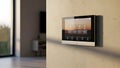 Smart Home Control Panel Wall Mounted Touchscreen Display with Icons and Sunset Background Royalty Free Stock Photo