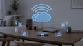 Smart home devices on a table with a cloud computing and Wi- Fi icon Royalty Free Stock Photo