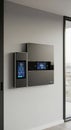 Smart home energy management system with display units on interior wall. Modern technology for household control and efficiency Royalty Free Stock Photo