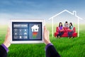 Smart house controller and young people Royalty Free Stock Photo