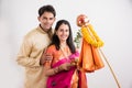 Indian Couple performing or celebrating Gudi Padwa Puja