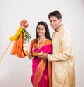 Indian Couple performing or celebrating Gudi Padwa Puja