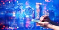 Smart industry concept with person using a smartphone at night Royalty Free Stock Photo