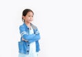 Smart kid girl crossed arms with face smiling looking out isolated on white background with copy space Royalty Free Stock Photo