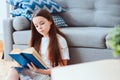 smart kid girl reading interesting book Royalty Free Stock Photo