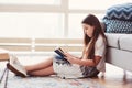 Smart kid girl reading interesting book at home Royalty Free Stock Photo