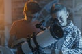 Smart kids using a telescope and stargazing Royalty Free Stock Photo