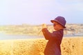 Smart little boy taking photos while travel in Royalty Free Stock Photo