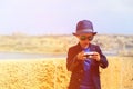Smart little boy taking photos while travel in Royalty Free Stock Photo