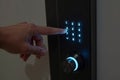 Entering Code on Smart Lock Keypad at Night, generative ai Royalty Free Stock Photo