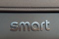 Smart logo on the rear of a Fortwo, city car made in France by German automaker Daimler AG, PKA Mercedes