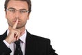 Smart man asking for silence Royalty Free Stock Photo